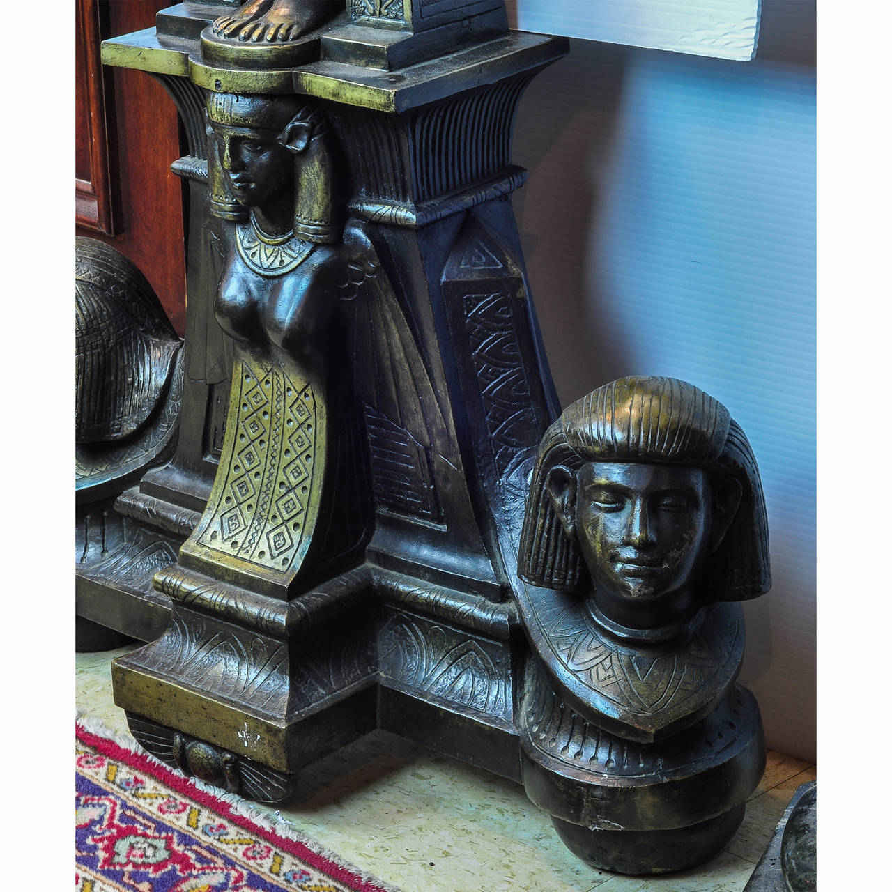 20th Century Pair of Egyptian Revival Patinated and Gilt Bronze Figural Andirons