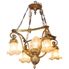 Petit lustre de style Louis XV à cinq lumières en bronze doré