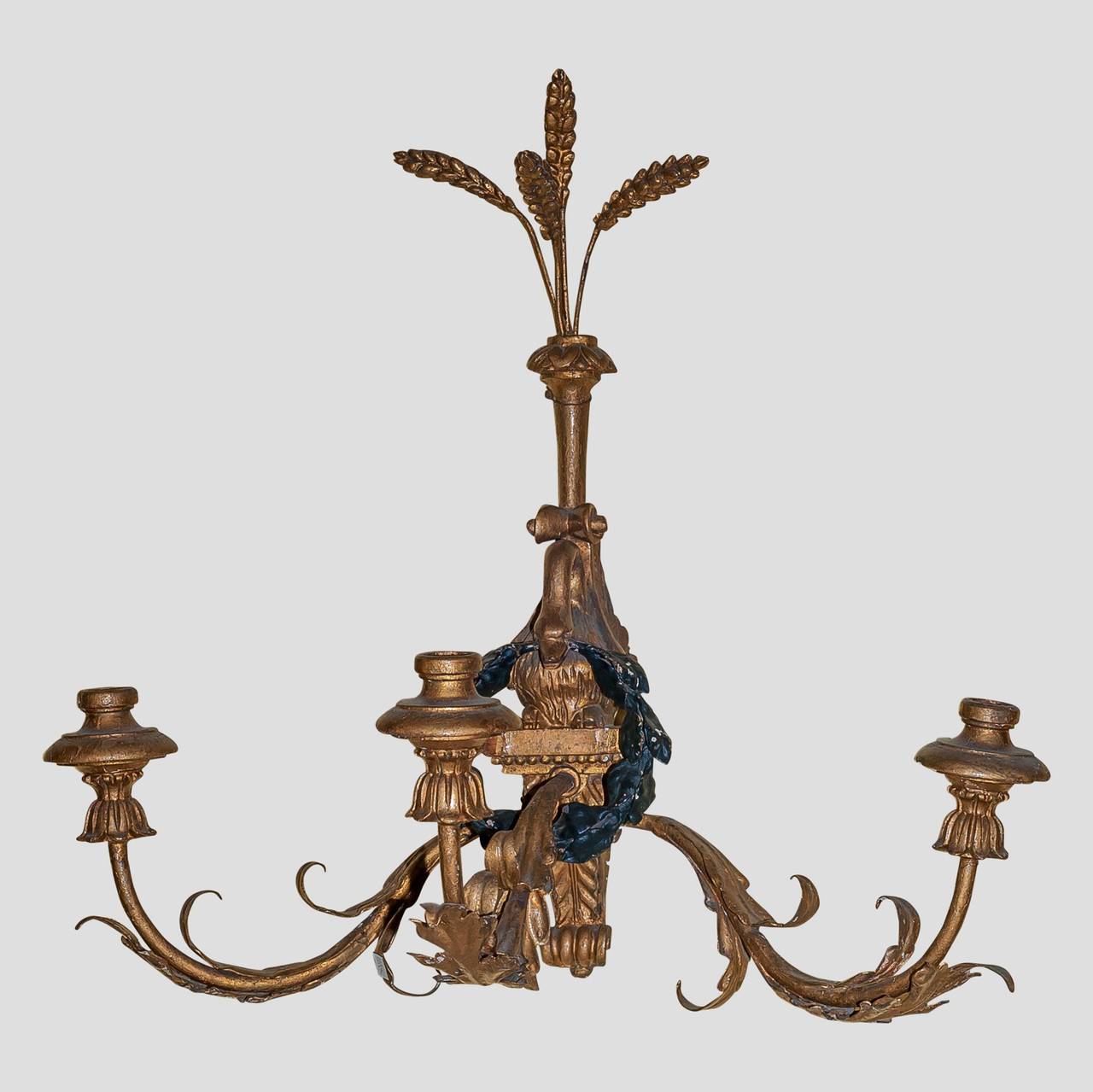 Pair of giltwood and tole three-arm wall light sconces
Stock number: L292.