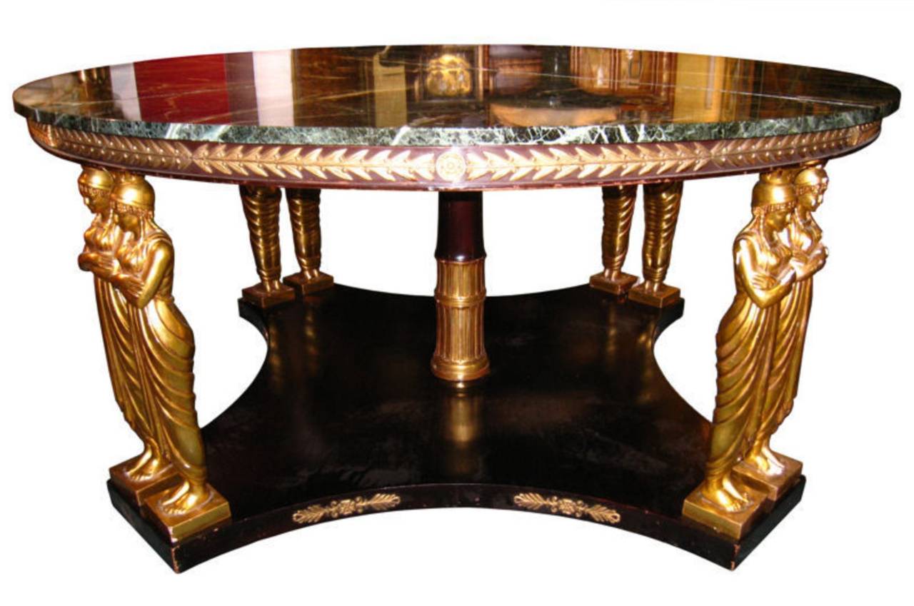This extraordinary antique Empire Revival mahogany center table measures an impressive 70.5