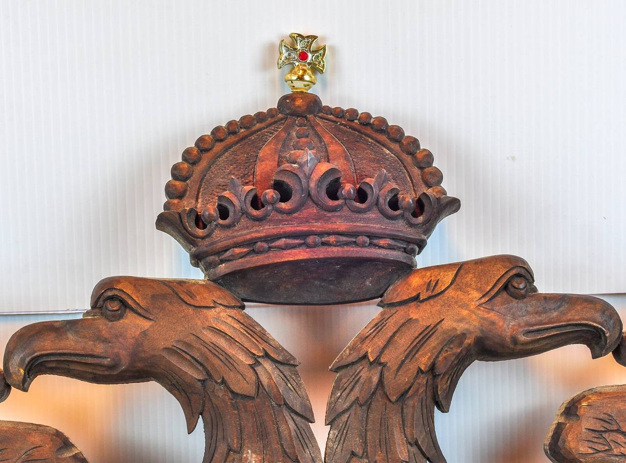 Carved Figural Coat of Arms with Double Headed Eagle with Portrait of a Man