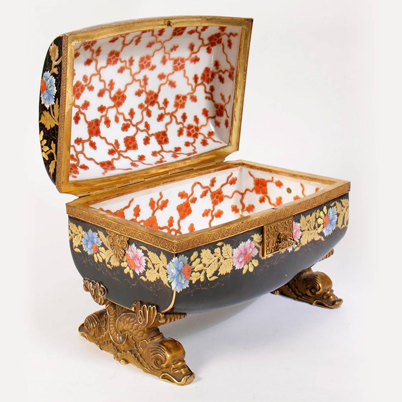 An exquisite faux cloisonné bronze-mounted porcelain box or jewelry casket with key, decorated with peonies and gilt vines on bronze figural legs.
Stock number: DA43.