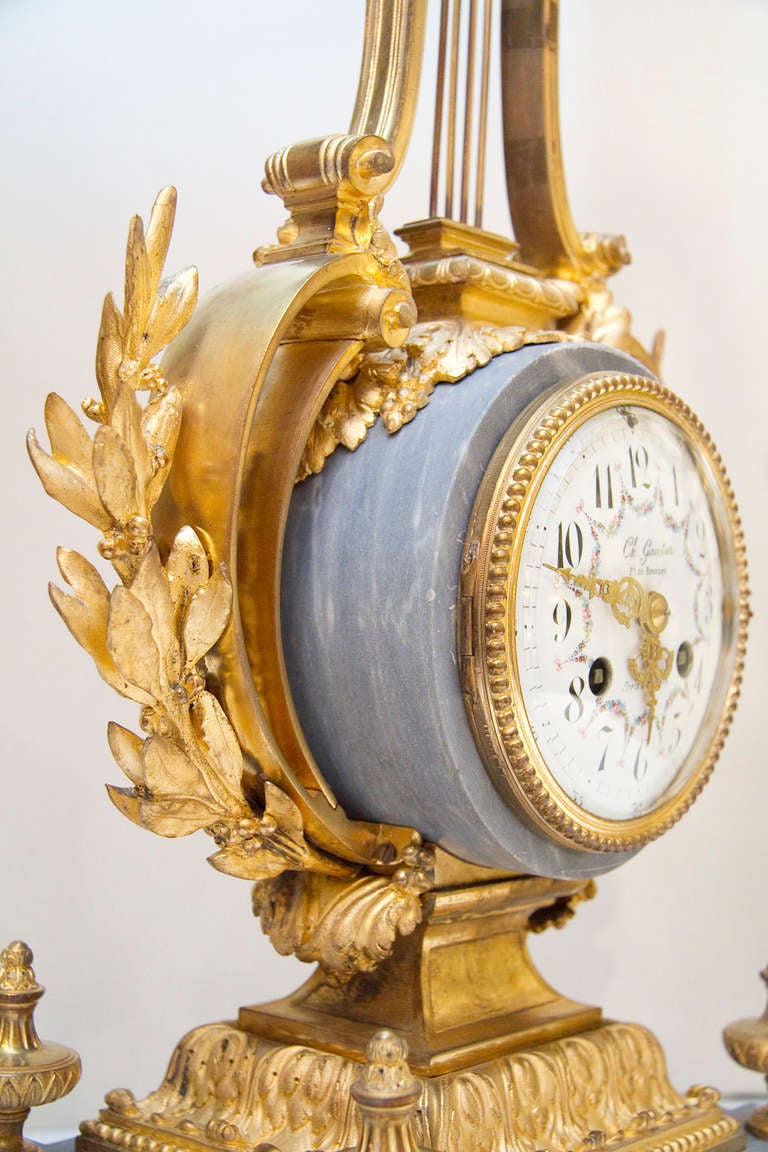 19th Century A  Louis XVI style gilt  Bronze and  Bleu Turqin marble clock set