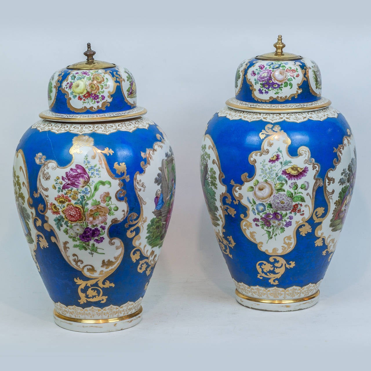 Pair of Meissen Style Blue Porcelain Covered Jars with Painted Scenes.
Stock Number: PP21