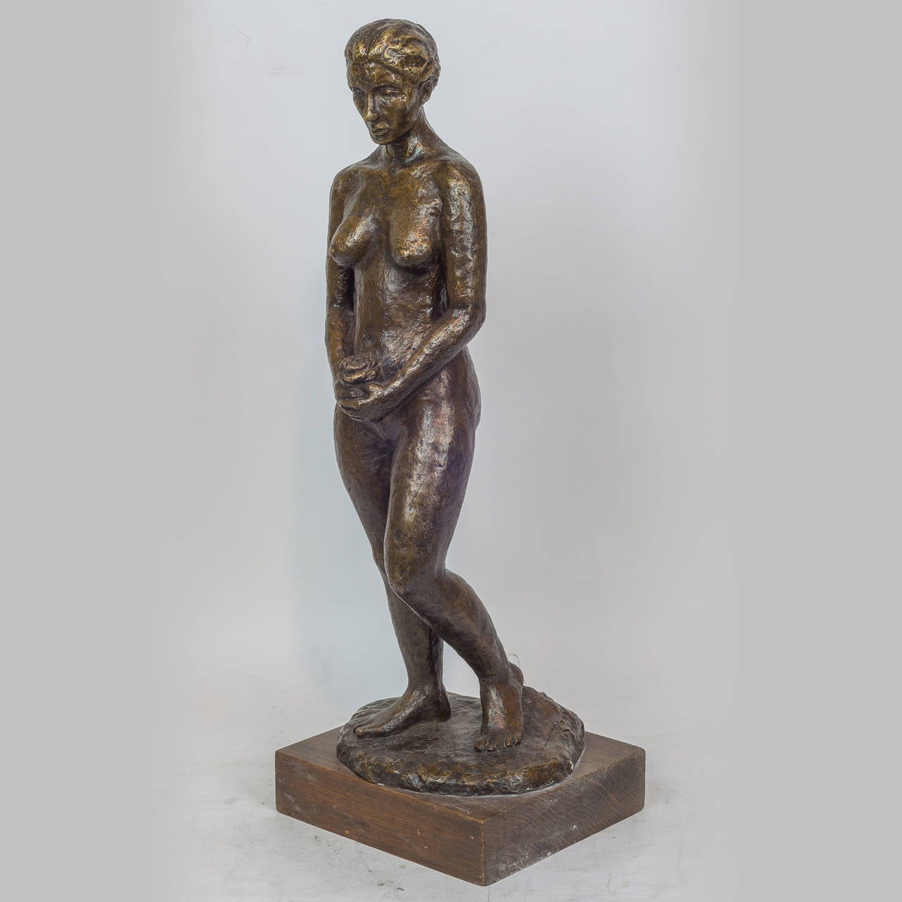 Patinated Bronze Figure of a Standing Nude Holding Flowers
Illegible Signature
Stock Number: SC86