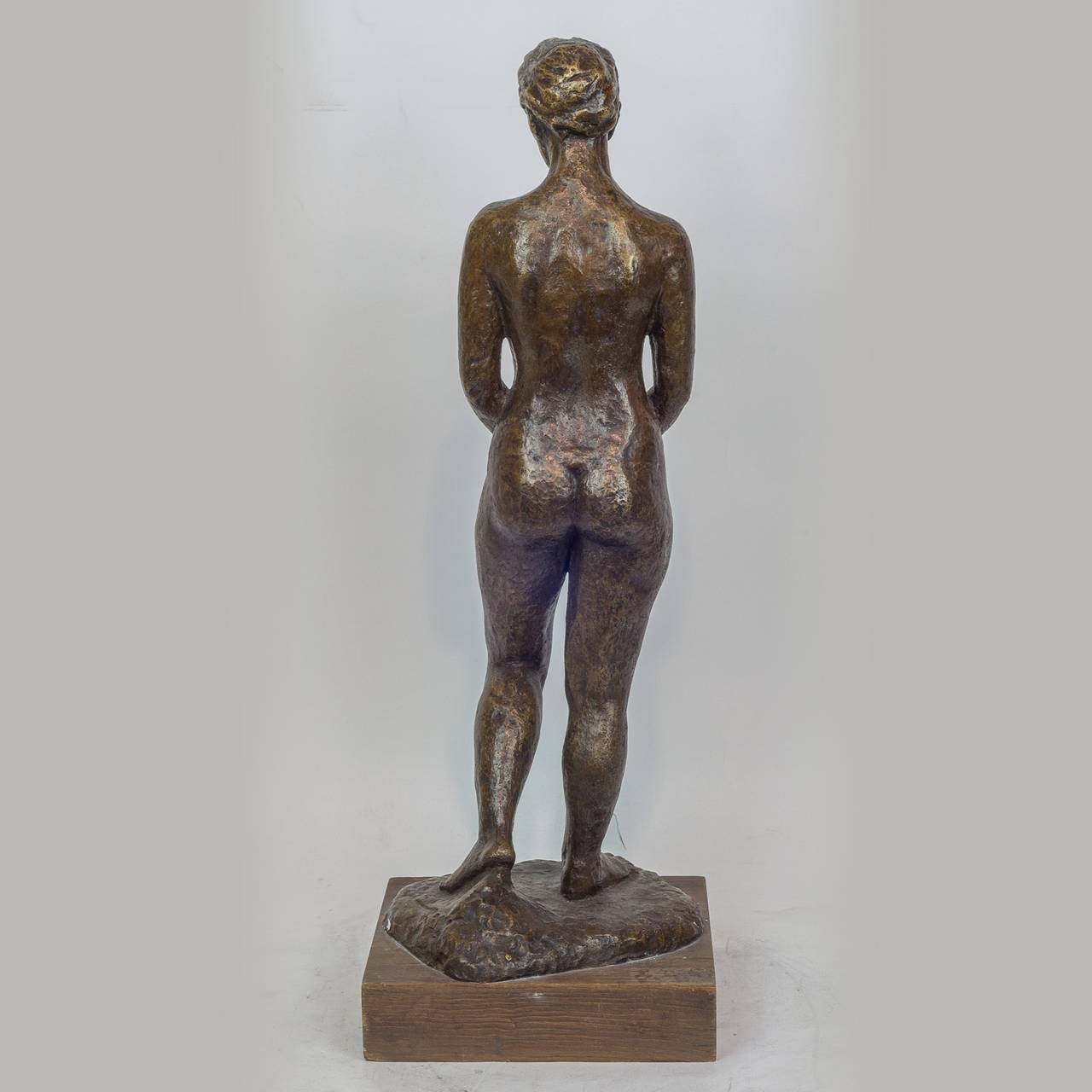 Patinated Bronze Figure of a Standing Nude Holding Flowers 1