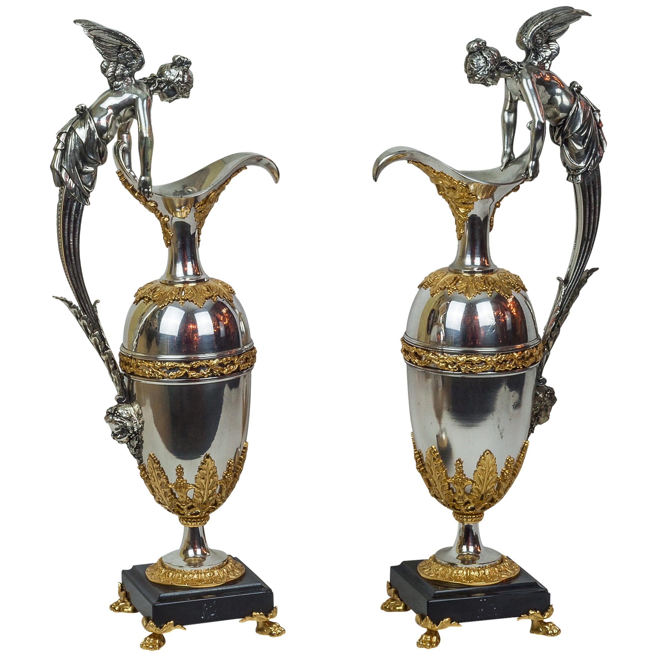 Pair of Empire Style Gilt and Silvered Bronze Ewers