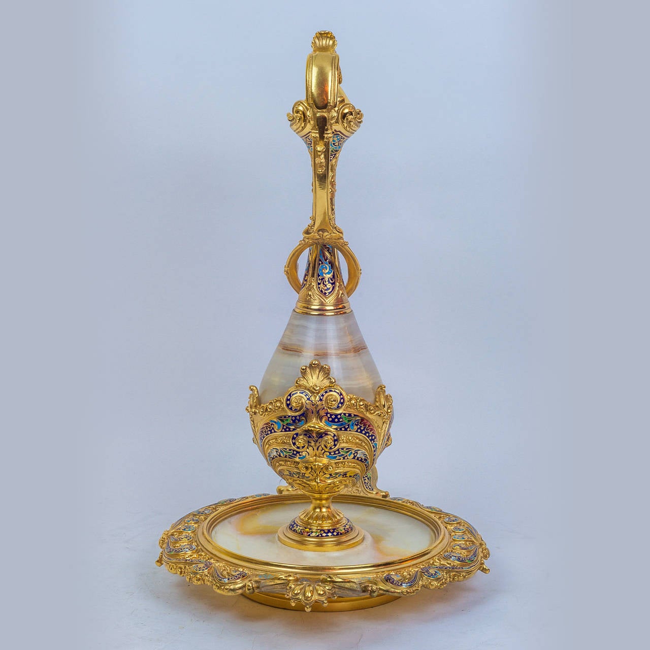 A fantastic gilt bronze and onyx and champleve enamel pitcher and basin.
Stock number: DA51.