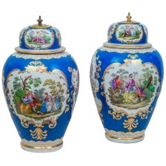 Pair of Meissen Style Blue Porcelain Covered Jars with Painted Scenes