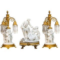 Three Piece Sevres Bisque And Bronze Garniture Set