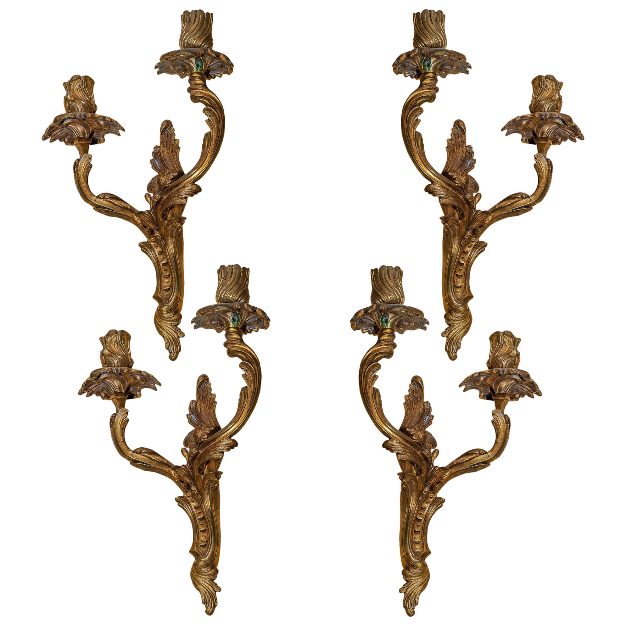 Set of Four Gilt Bronze Two-Arm Wall Sconces