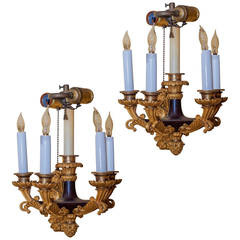 Two French Empire Style Patinated and Gilt Bronze Four-Arm Wall Light Sconces