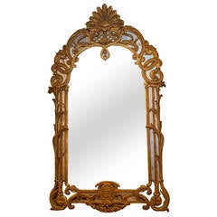 Exquisite Giltwood and Gesso Carved Venetian Mirror with Masked Sunburst