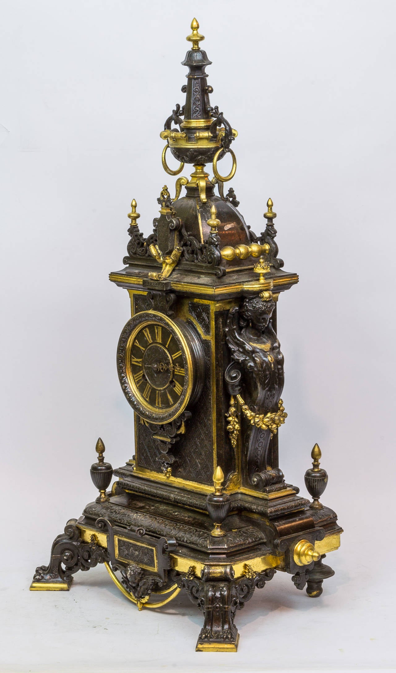 French Gilt and Patinated Bronze Figural Renaissance Style Mantel Clock