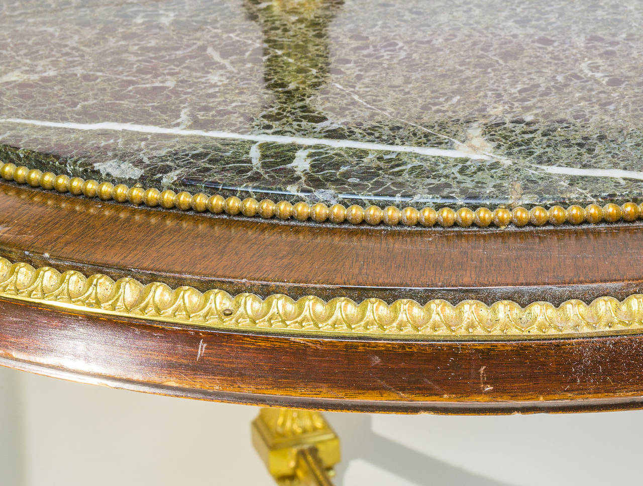 Egyptian Revival Gilt Bronze Figural Two-Tier Marble and Glass Table In Excellent Condition In New York, NY