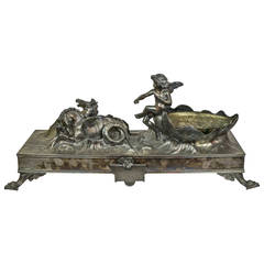 Silvered Metal Centerpiece with Seahorses Carrying Winged Angel