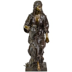 Signed Orientalist Bronze Figure of a Gypsy Seated on Rocks Holding Water Jug