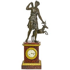 Patinated and Gilt Bronze Figural Mantel Clock with Diana the Huntress