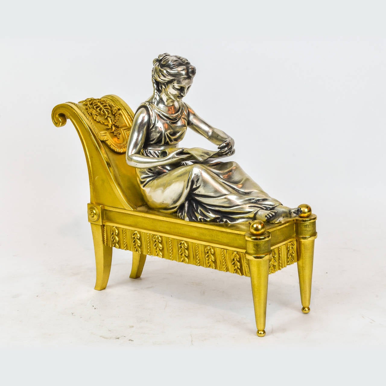 Pair of Neoclassical Gilt and Silvered Bronze Figural Chenets