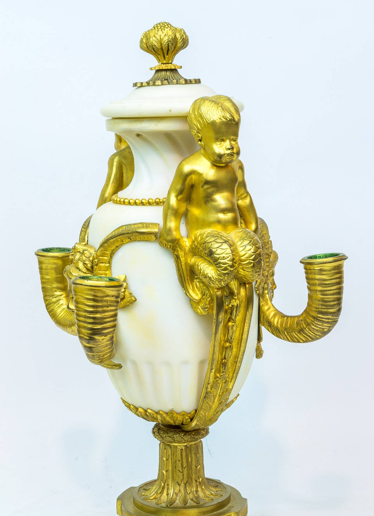 Pair of Louis XV Style Gilt Bronze and Marble Figural Urns with Seated Puttis on Side
Stock Number: DA71