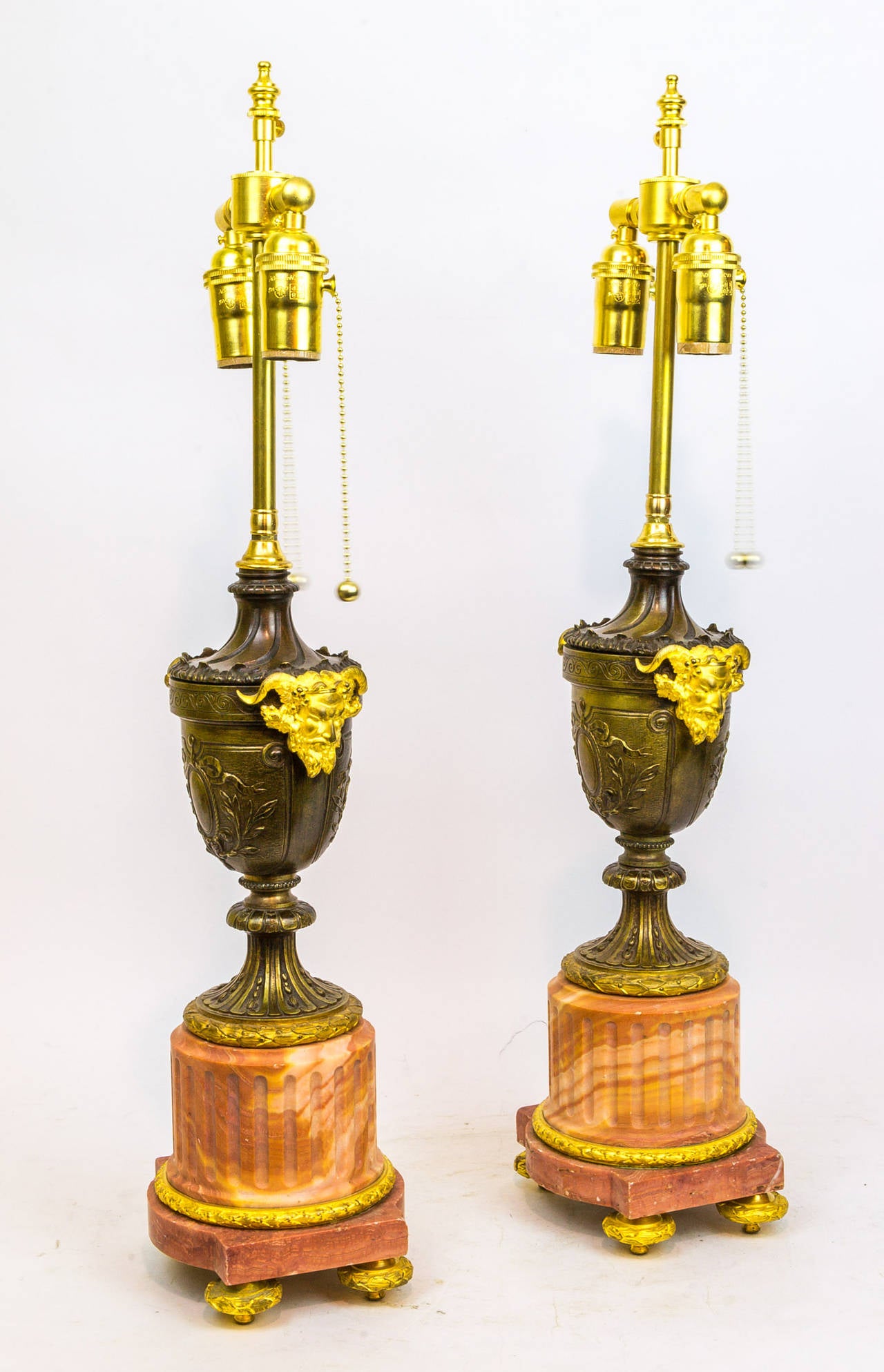 Louis XVI Style Pair of Marble and Bronze Lamps with Mask Face Handles
Stock Number: LL29