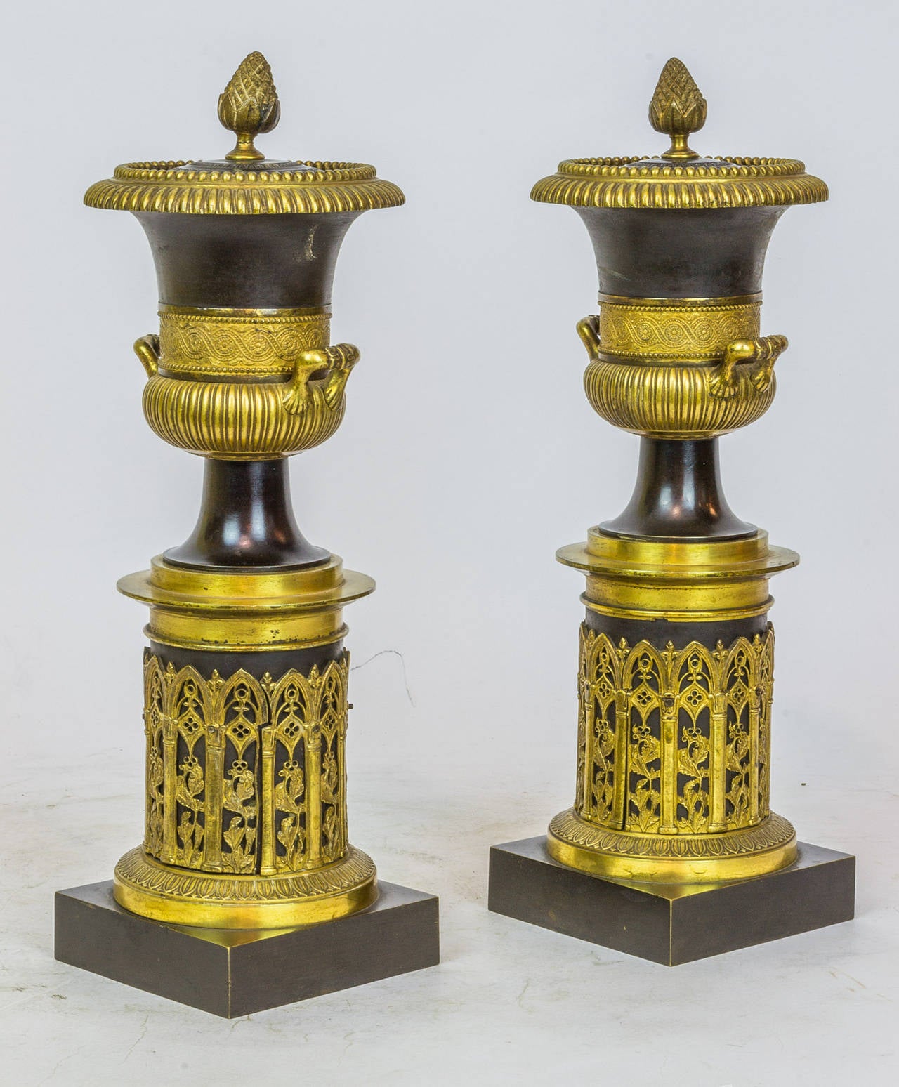 French Pair of Empire Style Patinated and Gilt Bronze Covered Urns