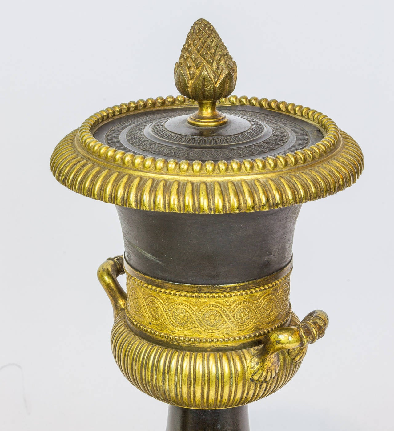 Fine Pair of Empire Patinated and Gilt Bronze Covered Urns
Stock Number: DA74