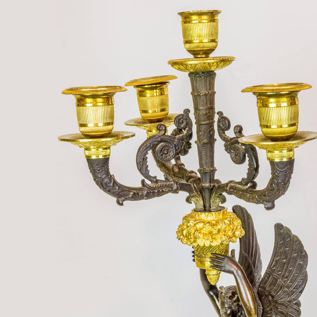 19th Century Pair of Empire Style Gilt and Patinated Bronze Figural Candelabras