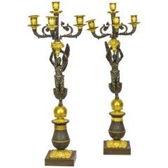 Pair of Empire Style Gilt and Patinated Bronze Figural Candelabras