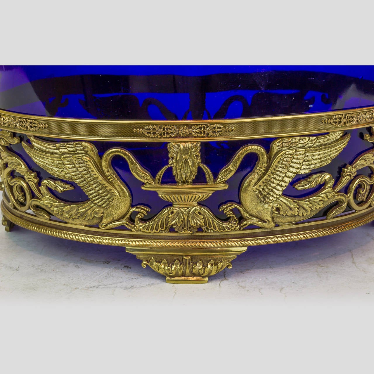 An Oval Silver Plated Neoclassical Centerpiece with Blue Glass Insert
Stock Number: DA82