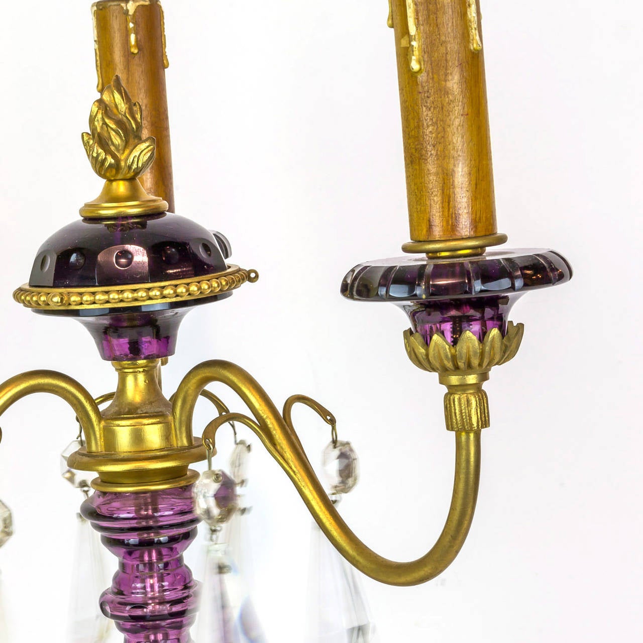 A pair of amethyst colored glass and gilt metal three-arm candelabras
Stock number: LC18.