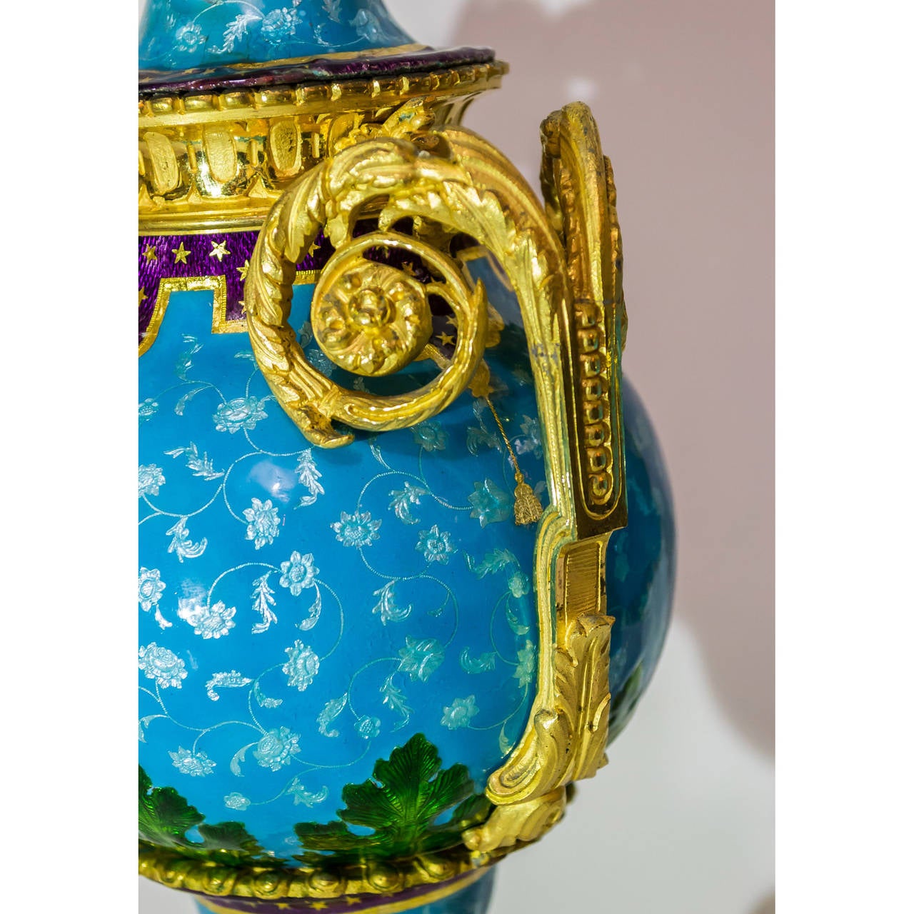 Fine Pair of Celeste Blue Enamel and Bronze Covered Urns on White Marble Base