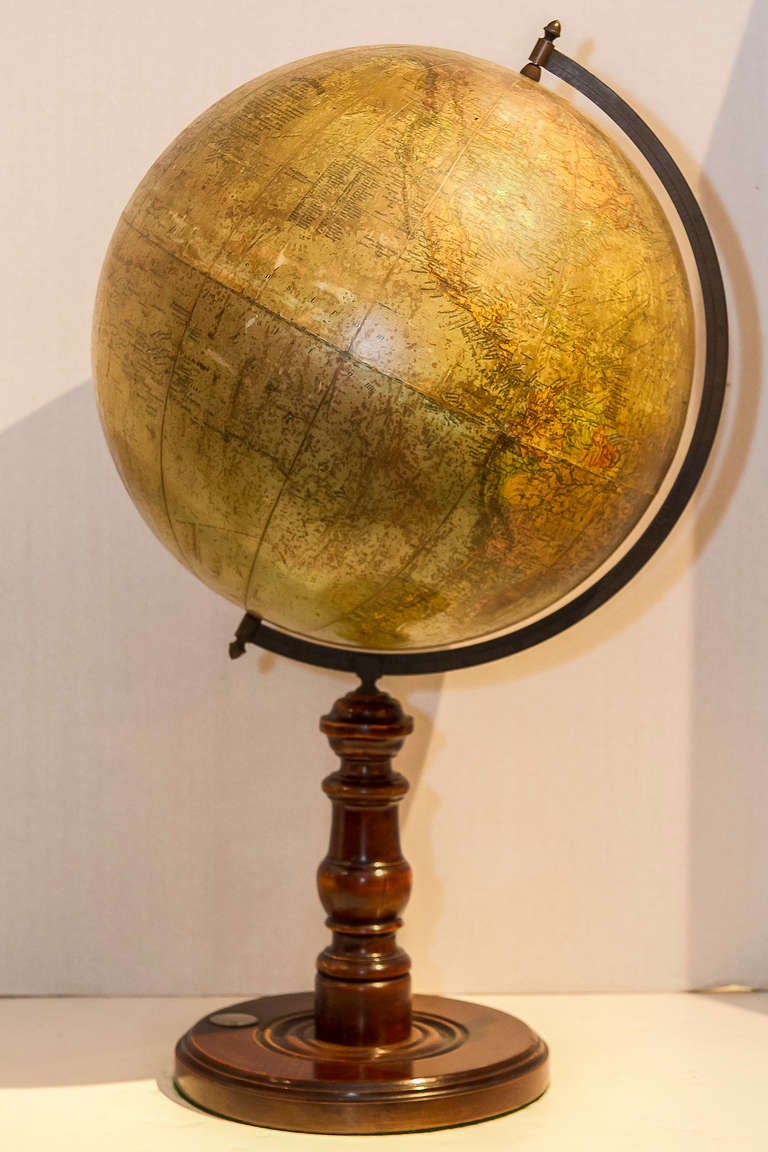 A desk globe on wooden base with compass 1