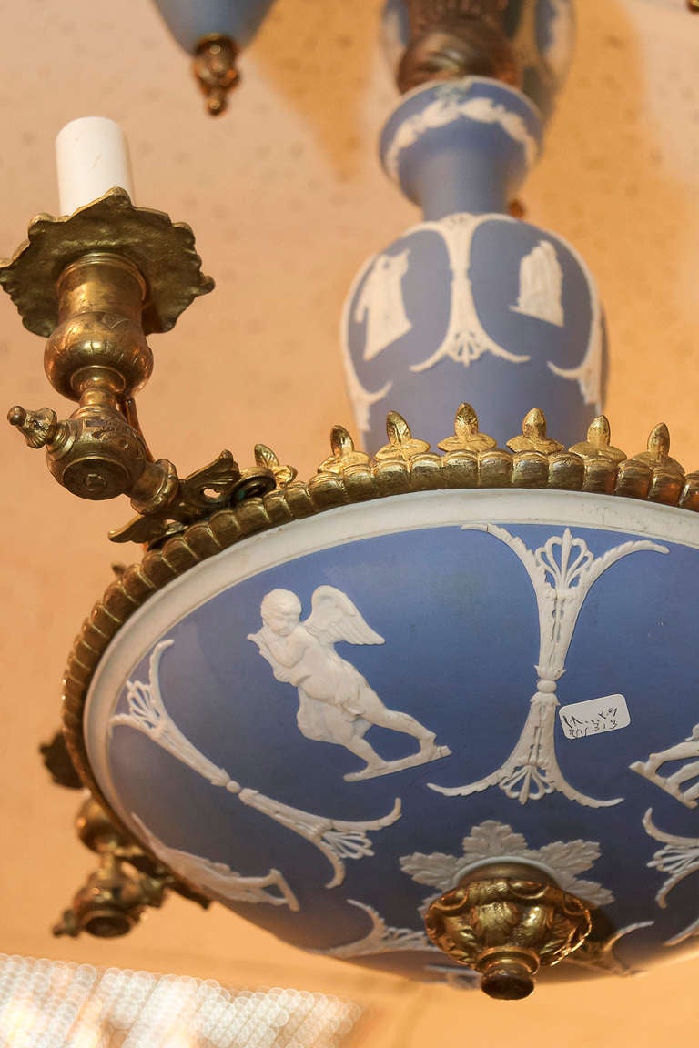 English A Bronze and Wedgwood Blue and White 4 Light Chandelier