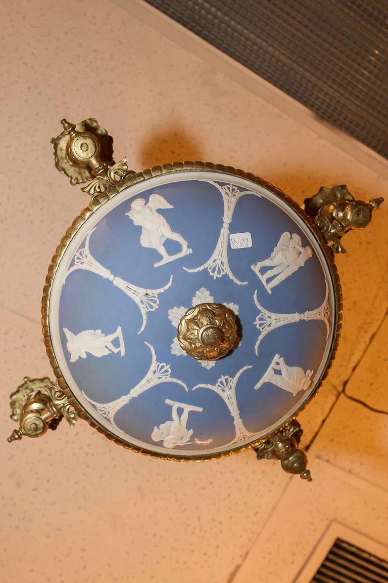 A Bronze and Wedgwood Blue and White 4 Light Chandelier In Good Condition In New York, NY