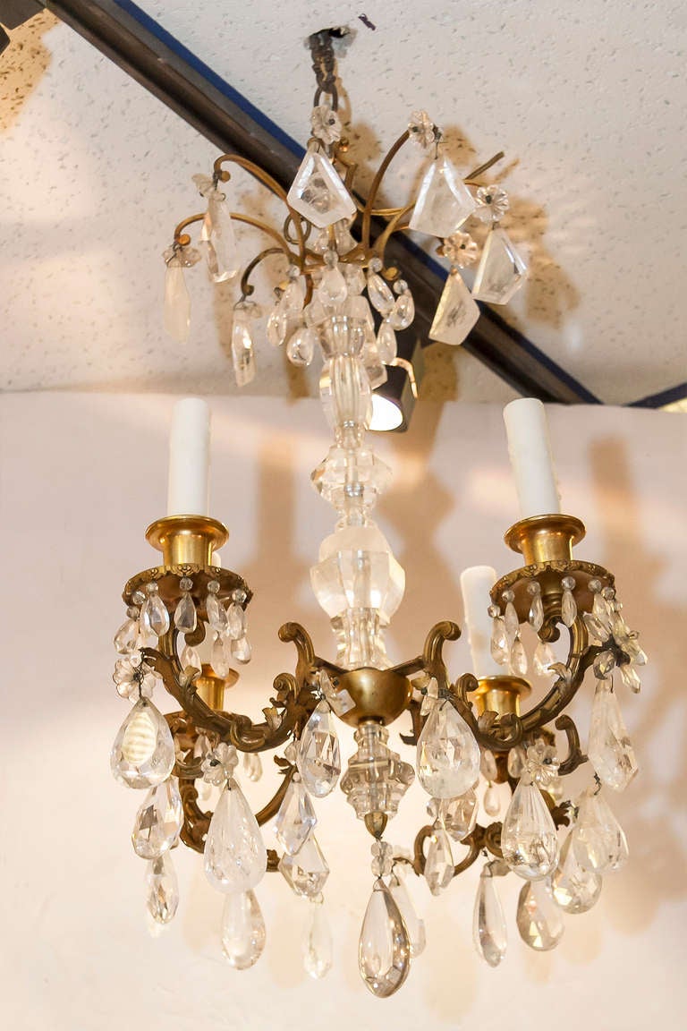 A very fine French rock crystal and bronze four-light chandelier.
Stock Number: L302.