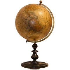 Vintage A desk globe on circular wooden base