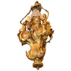 A Louis XV Style Gilt Bronze Figural 4 Light Cherub Chandelier