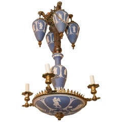 A Bronze and Wedgwood Blue and White 4 Light Chandelier