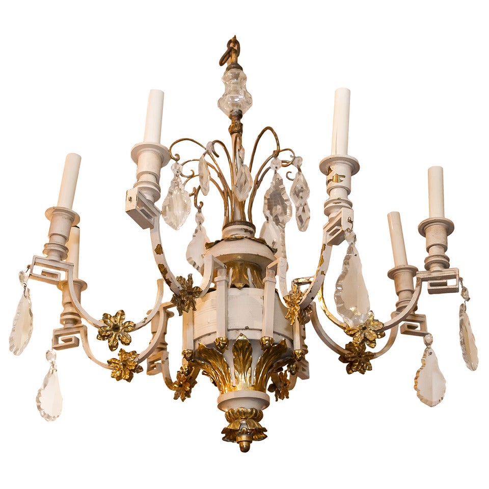 A Rustic Painted Metal and Gilt 8 Arm Chandelier For Sale