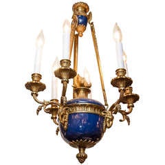 A Louis XVI Style Six Light Chandelier with Rams Head