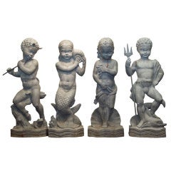 Four Lead Garden Statues After A Model by Wheeler Williams