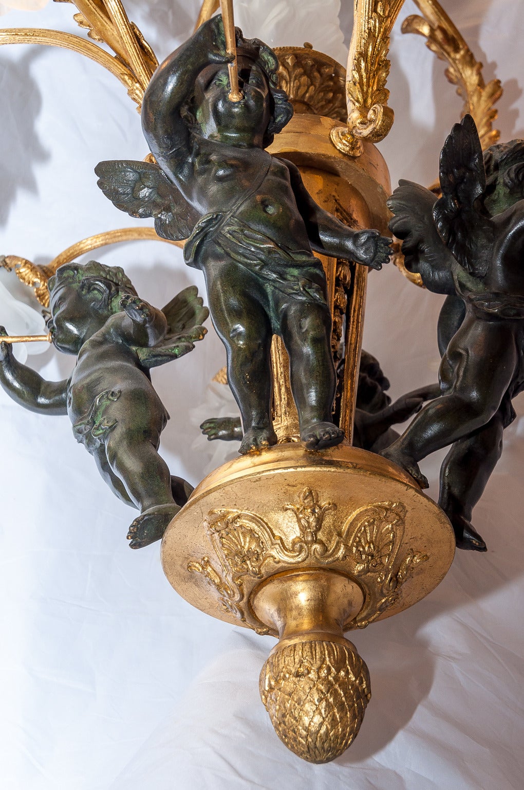 French Patinated and Gilt Bronze EightLight Figural Cherub Chandelier