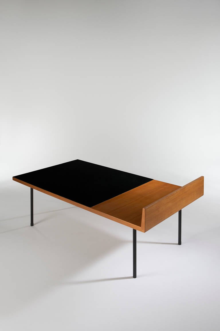Low table by Andre´ Monpoix in frene (ash) and formica with black painted metal legs. Designed for Meuble TV in 1955.