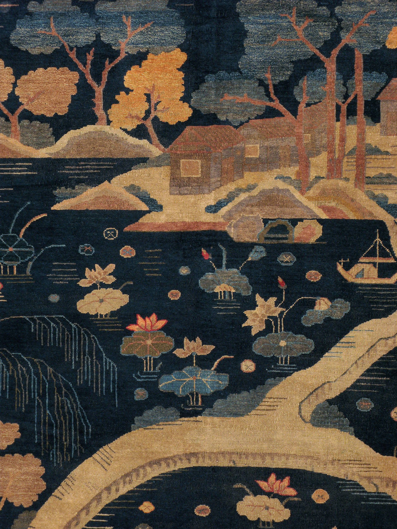 An antique Chinese Peking deco carpet from the first quarter of the 20th century.