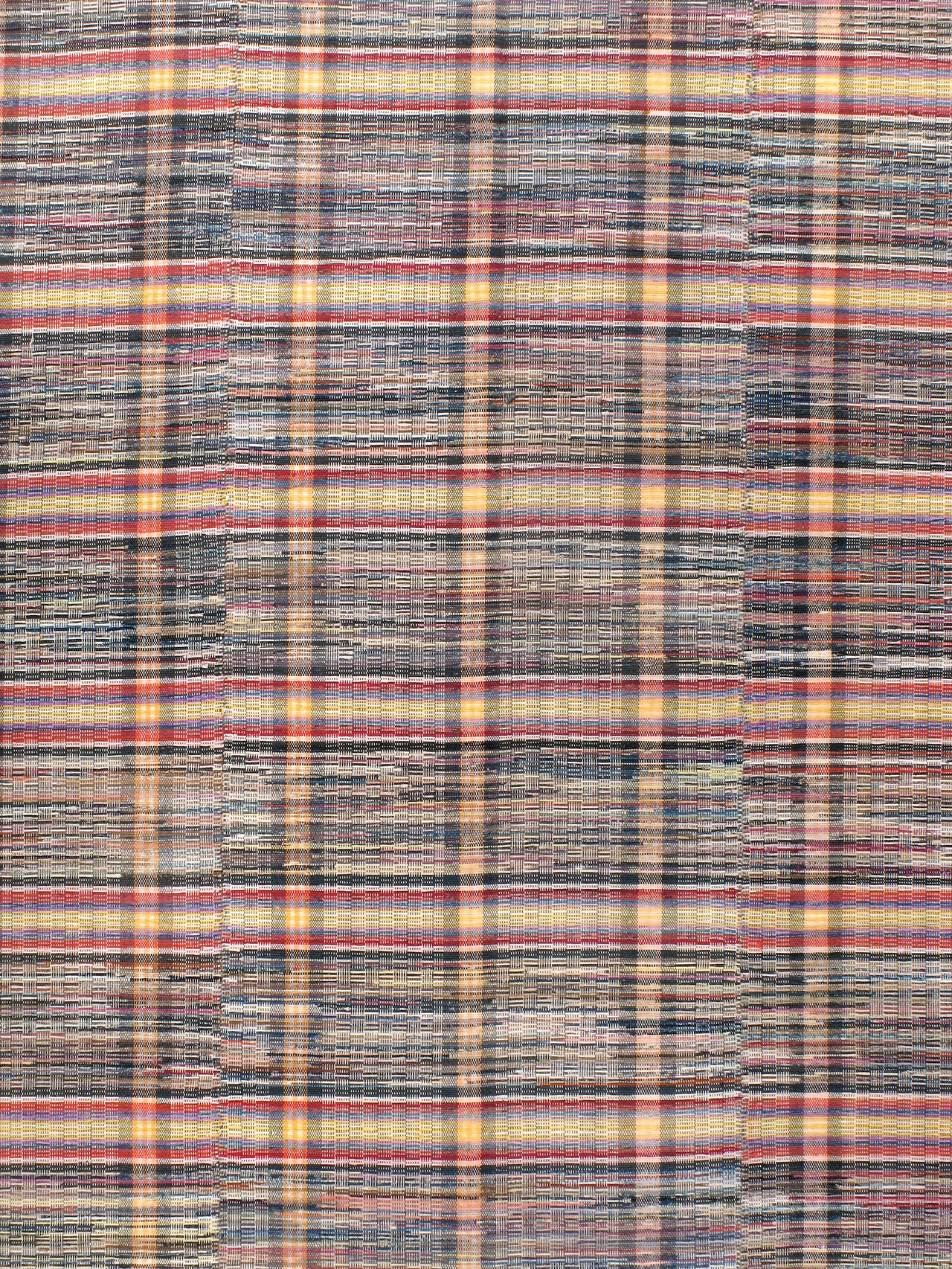 An American mid-20th century rag rug featuring a plaid style pattern.
