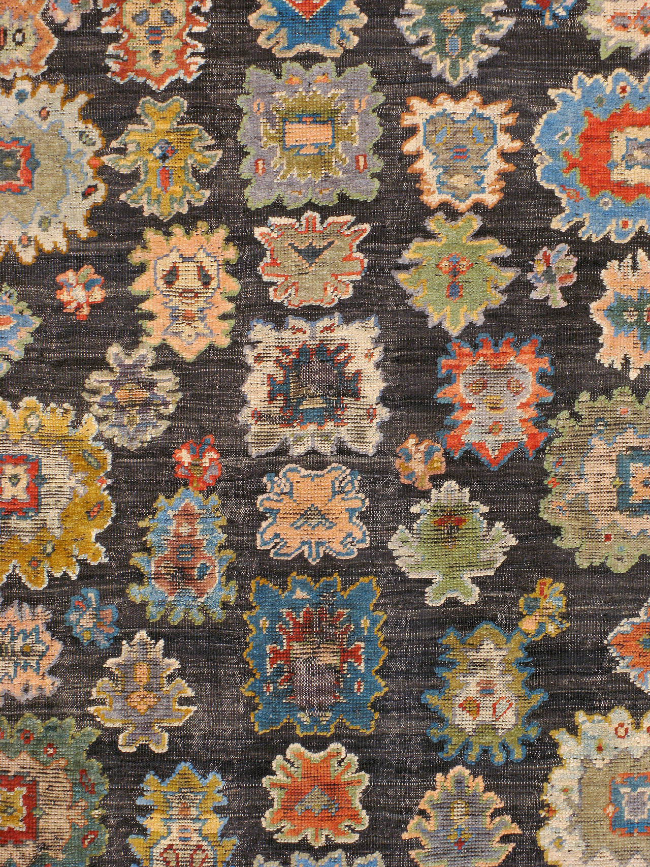 A contemporary Souf Oushak carpet from the fourth quarter of the 20th century. The rug is woven with repurposed old wool to create a vintage look and feel. A venerated technique, Souf is a flat-woven carpet with a raised pile to form its motif.