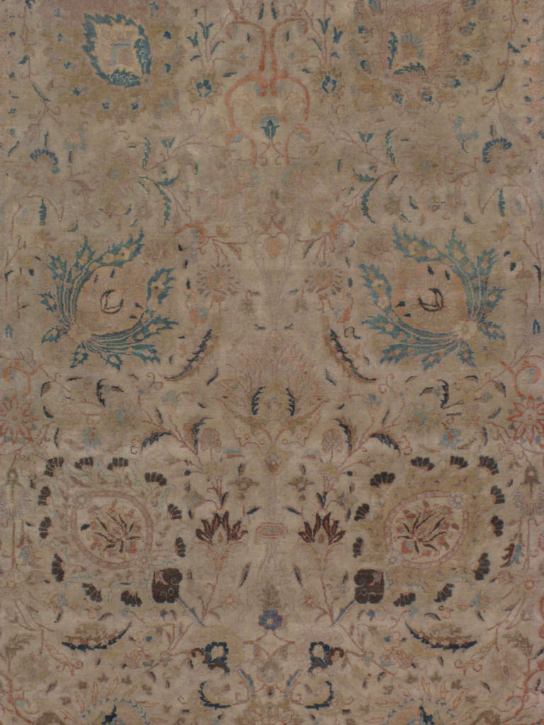 An early 20th century Persian Tabriz.  Since the 17th century, Iran started exporting artisan carpets around the world, especially to Europe.  Artists used one of the three versions of vertical looms later referred to as a Tabriz Loom.  Artists