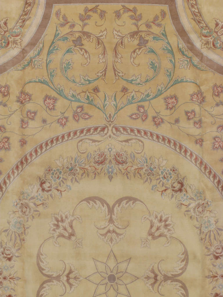 A second quarter, mid 20th century Persian Kashan carpet in the style of European French Savonnerie rugs.