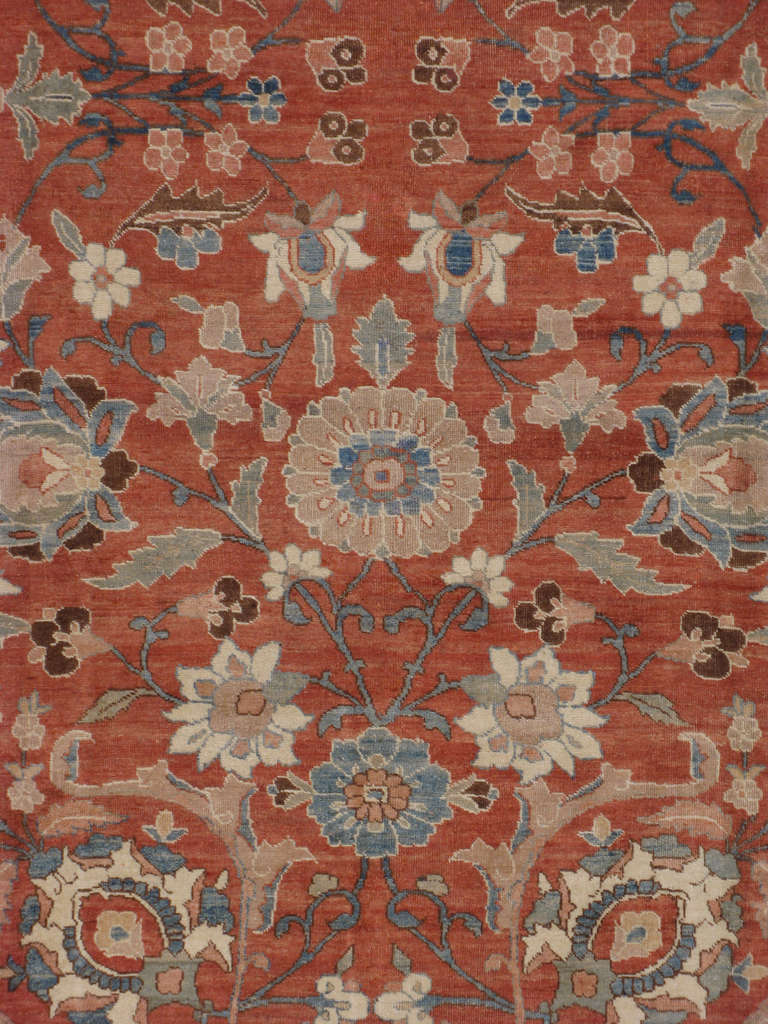 An early 20th century Persian Tabriz.  Since the 17th century, Iran started exporting artisan carpets around the world, especially to Europe.  Artists used one of the three versions of vertical looms later referred to as a Tabriz Loom.  Artists
